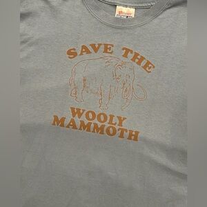 Mid 2000’s Save the wooly mammoth double stitch light blue t